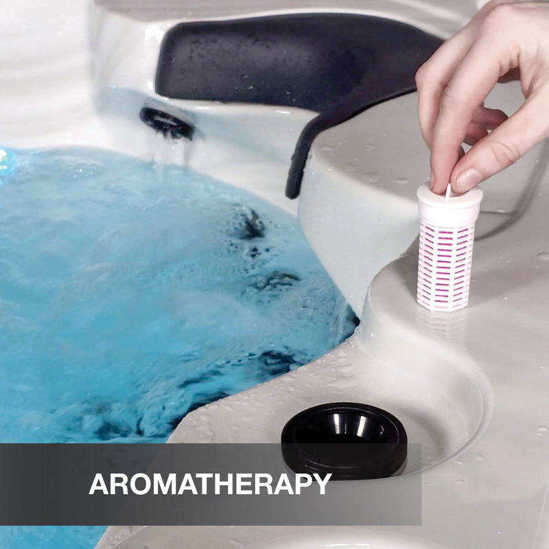 Hand placing a filter into a hot tub with 'Aromatherapy' text overlay.