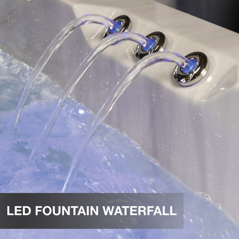 LED fountain waterfall feature in a bathtub with water flowing.