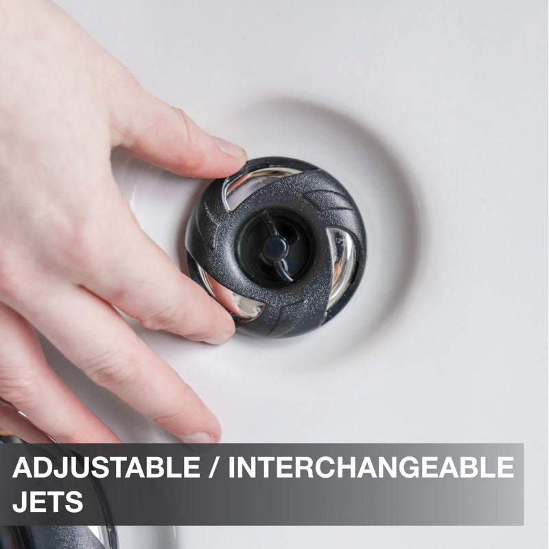 Hand adjusting a shower head with text 'Adjustable/Interchangeable Jets' on a neutral background